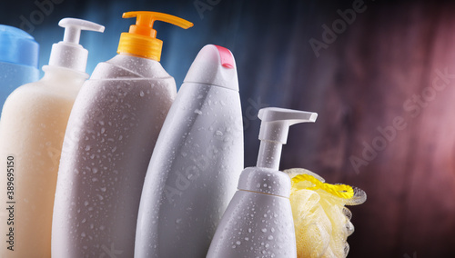 Plastic contaiers of shampoos and shower gels photo