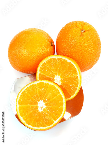 Juicy oranges isolated on a white background.