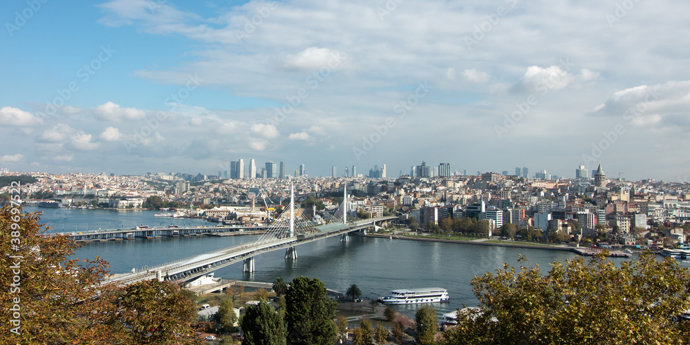 Fototapeta premium View of the Bridge over the Golden Horn and the city of Istanbul on the opposite high bank