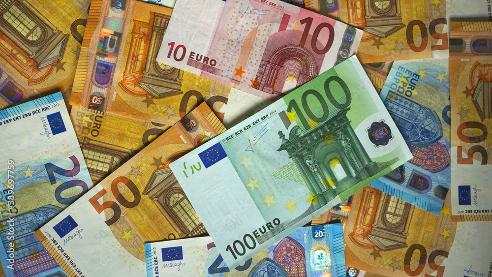 pile of paper euro banknotes as part of the united country's payment system pile of paper euro banknotes as part of the united country's payment system