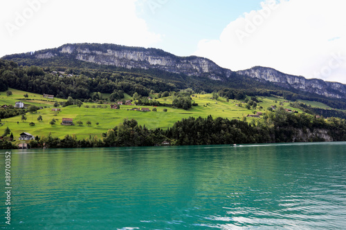 Lake with a picturesque hillside in the background