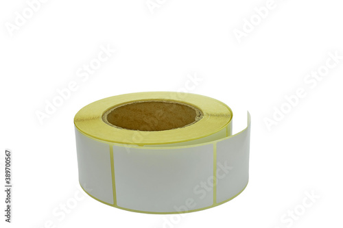Blank Label Stickers, isolate on a white background. Babina of self-adhesive stickers. White roll of labels for thermal perforation. Self-adhesive white label roller for printing or manufacturing