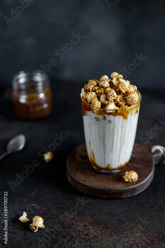 Caramel and popcorn milkshake dark and moody food photography