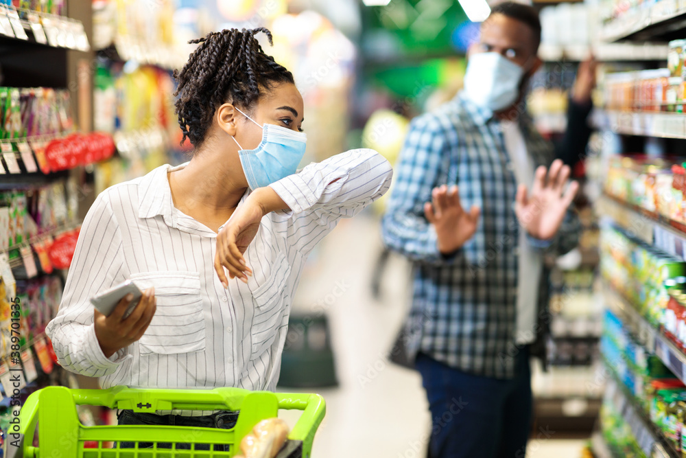 Sick Black Lady In Mask Coughing Buying Grocery In Supermarket
