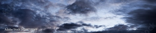 Background cloudscape great sky panorama with dark clouds showing a weather change