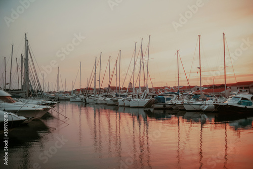 There are many yachts, boats and ships at sea. Marina at sunset. Vosice Croatia Gorgeous summer sunset by the ocean © MoreThanProd