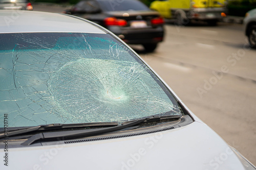 Closeup of car with broken windshield  Car crash accident damaged on the road car crash accident on street in the city road.
