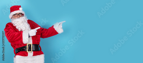 santa claus pointing isolated on background