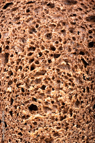 The texture of the cut of traditional wheat-rye bread.