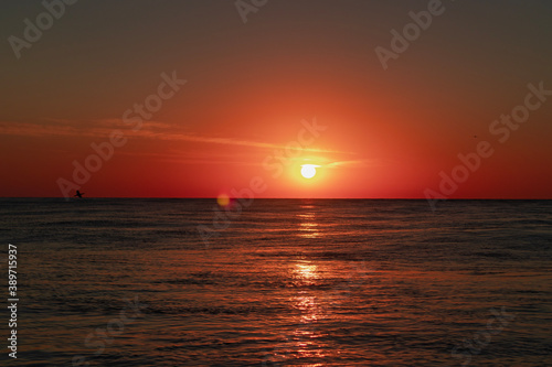 sunset over the sea © Ioan