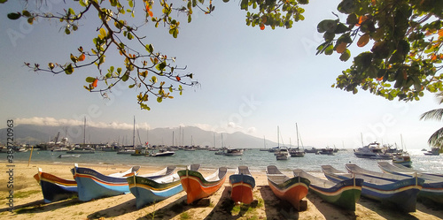 Ilha Bela boats in Brazil. Amazing beach and beautiful colors