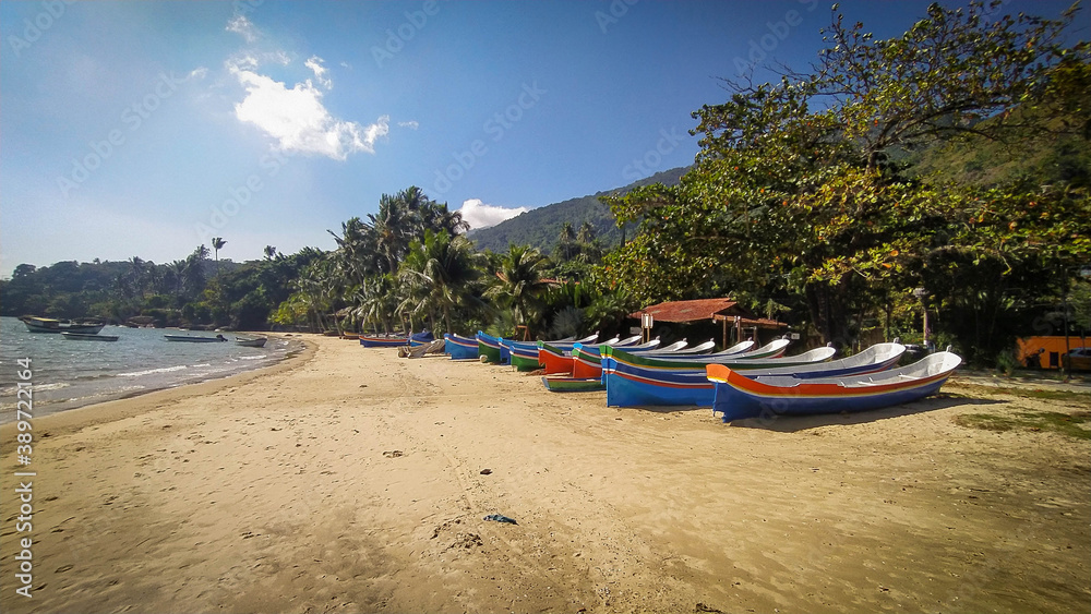 Fototapeta premium Ilha Bela boats in Brazil. Amazing beach and beautiful colors