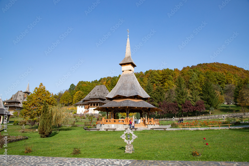 BARSAN, ROMANIA - OCTOBER 28, 2020: View of Barsana Wooden Monastery site in Maramures County, Romania. BARSAN, ROMANIA - OCTOBER 28, 2020: View of Barsana Wooden Monastery site in Maramures County, Romania.