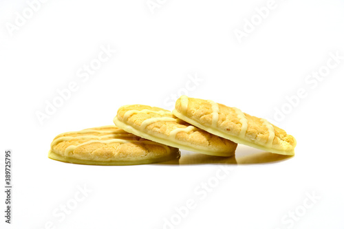 biscuit with stream of cream on a white background