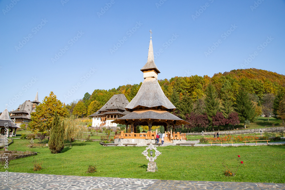 BARSAN, ROMANIA - OCTOBER 28, 2020: View of Barsana Wooden Monastery site in Maramures County, Romania. BARSAN, ROMANIA - OCTOBER 28, 2020: View of Barsana Wooden Monastery site in Maramures County, Romania.