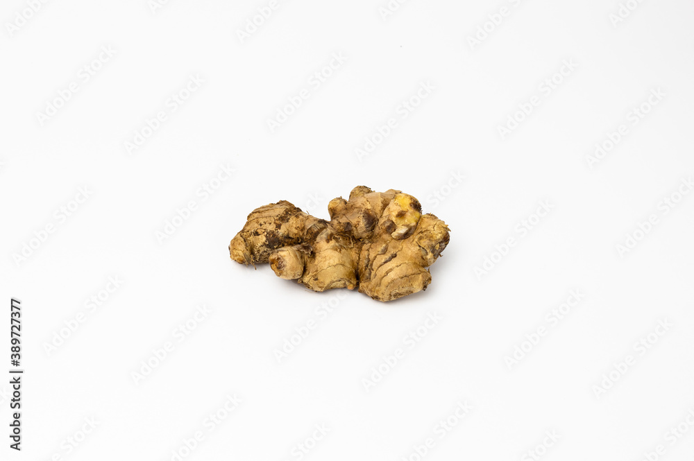 Fresh ginger on isolated white background, herb medical concept Fresh ginger on isolated white background, herb medical concept