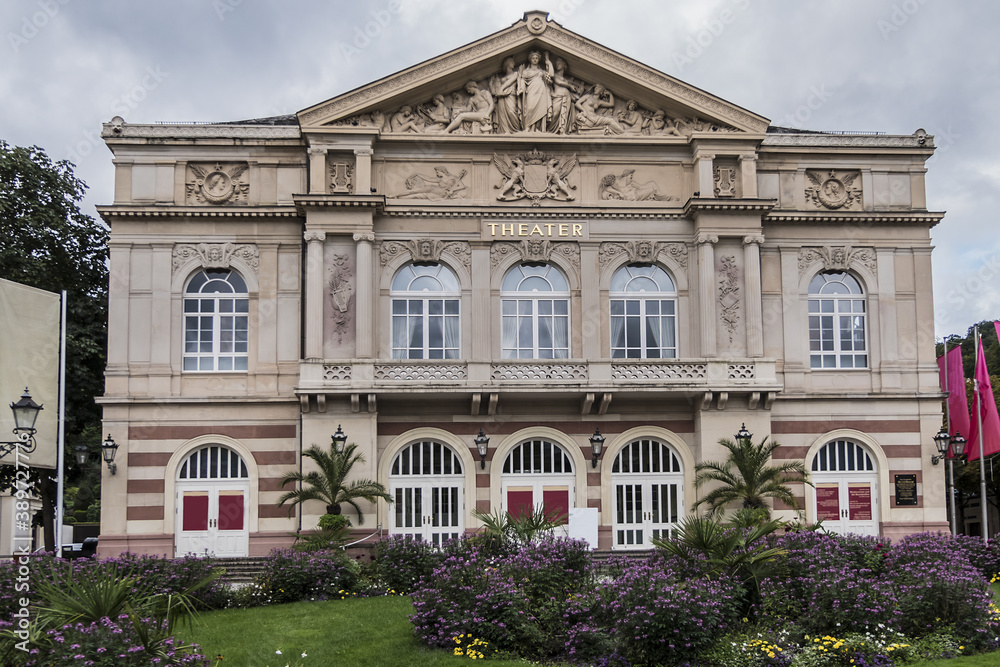 View of Baden-Baden Theater (1862) building. Baden-Baden Theater - neo-baroque white-and-red sandstone building. Baden-Baden, Germany.