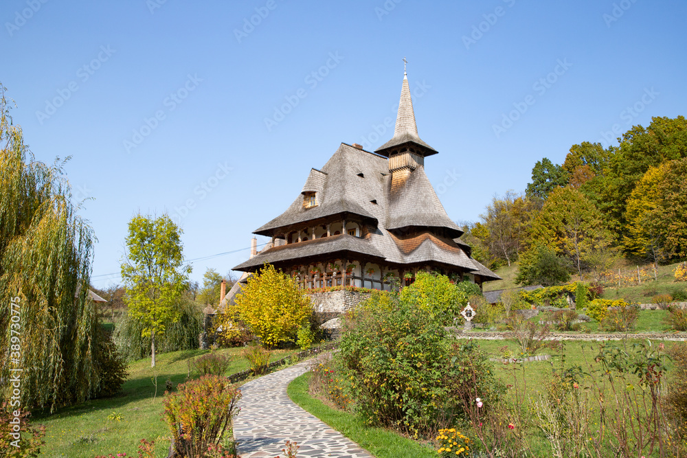 BARSAN, ROMANIA - OCTOBER 28, 2020: View of Barsana Wooden Monastery site in Maramures County, Romania. BARSAN, ROMANIA - OCTOBER 28, 2020: View of Barsana Wooden Monastery site in Maramures County, Romania.