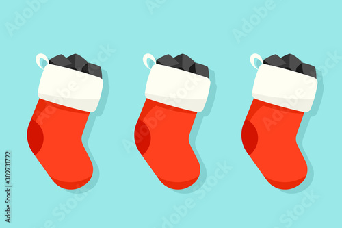 Three Christmas stockings with coal illustration. Clipart image.