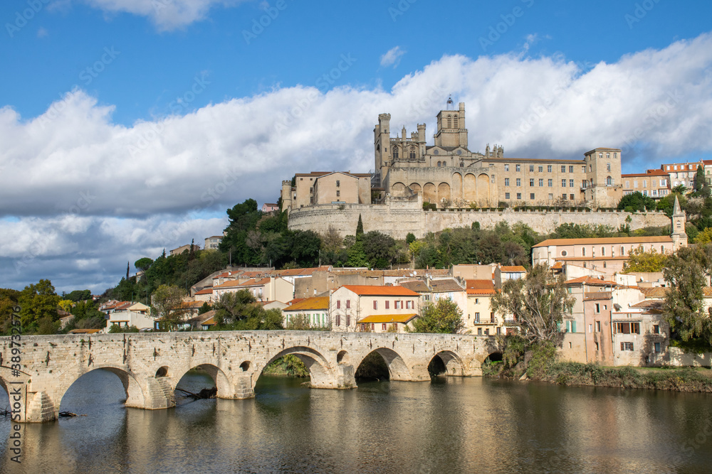 Historic bridge of Pont Vieux below the Cathedral of Béziers in the South of France