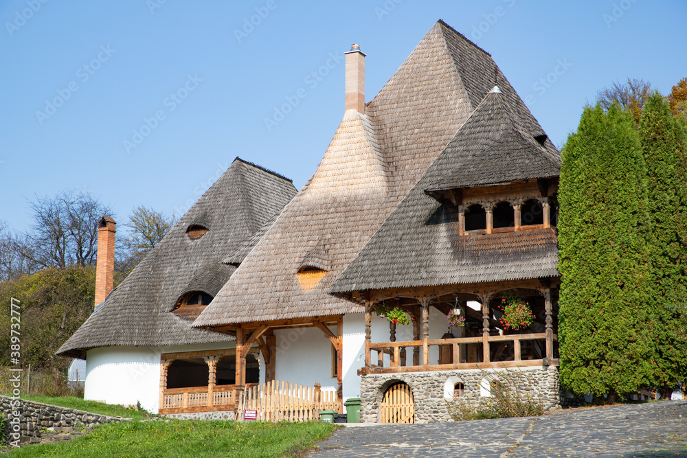 BARSAN, ROMANIA - OCTOBER 28, 2020: View of Barsana Wooden Monastery site in Maramures County, Romania.