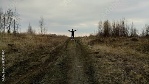 person walking in the field