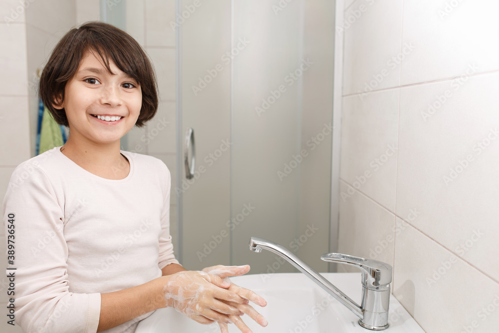 Teenage girl washes her hands. Teenage girl washes her hands.