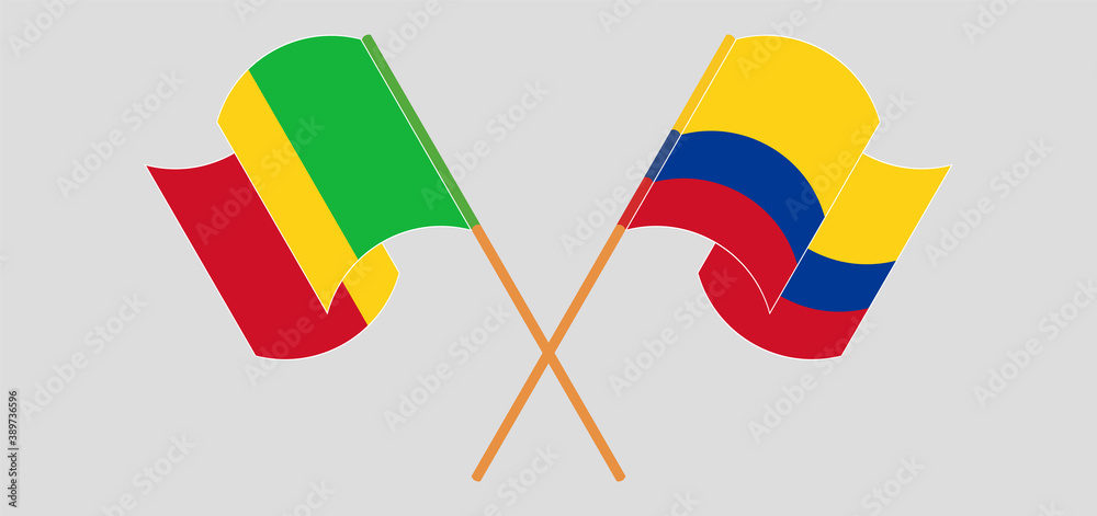 Crossed and waving flags of Mali and Colombia