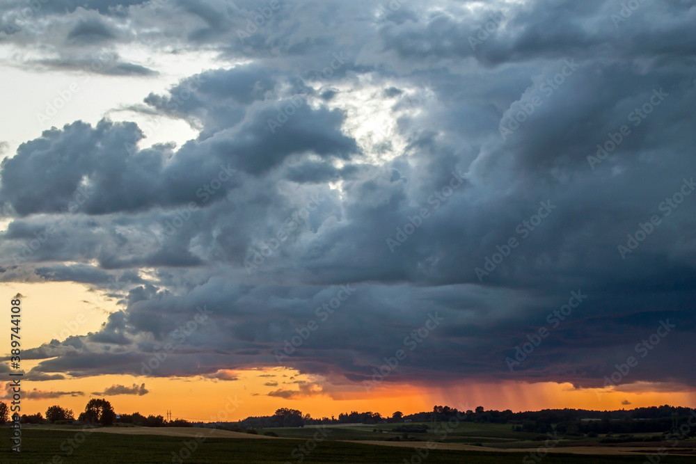 Dramatic sky over the fields. Agricultural landscape in eastern Lithuania.