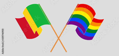 Crossed and waving flags of Mali and LGBTQ