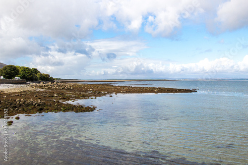 ORANMORE, COUNTY GALWAY, IRELAND - SEPTEMBER 13, 2018: View of the bay at Oranmore from a small pier in front of  Oranmore Castle. photo