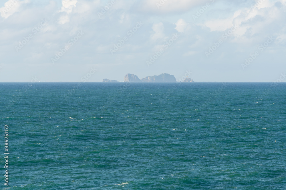 Berlengas island seen from Cabo Carvoeiro Cape in Peniche and atlantic ocean waves, in Portugal Berlengas island seen from Cabo Carvoeiro Cape in Peniche and atlantic ocean waves, in Portugal