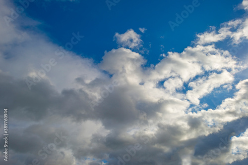 Clouds in a blue sky in bright sunlight in autumn, Almere, Flevoland, The Netherlands, November 2, 2020 