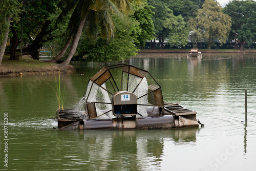 Fototapeta Naklejka Na Ścianę i Meble -  Turbine baler Installed in the pond to increase oxygen to the water in Thailand..