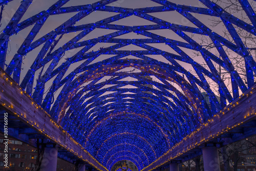 A trestle covered in a mesh of blue lights Fototapeta