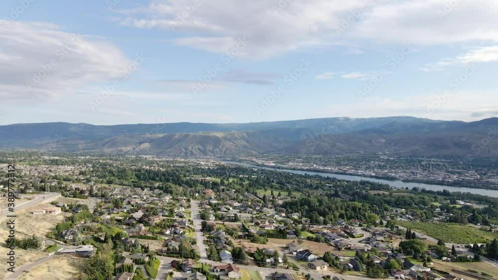 Aerial view on residential area of Wenatchee, USA panorama with Cascade Range 
