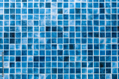 Pattern of Blue mosaic tiles on the wall texture background