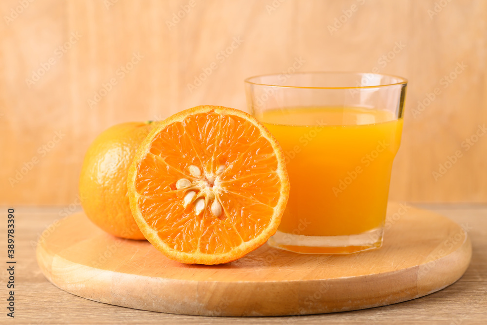 Fresh Honey Murcott orange fruit and juice on wooden background, Healthy drink Fresh Honey Murcott orange fruit and juice on wooden background, Healthy drink