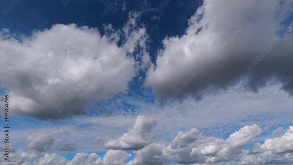 Blue sky and white clouds. Fluffy white clouds. Cumulus cloud. Blue sky and white clouds. Fluffy white clouds. Cumulus cloud.