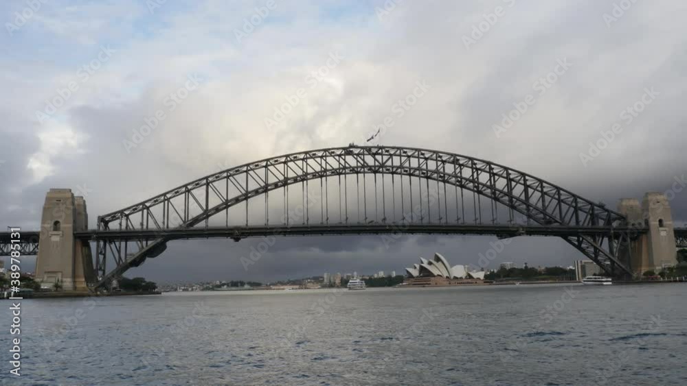 Sydney Harbour Bridge and Opera House with Ferry / Ship in Sydney Australia shot in 4k high resolution Sydney Harbour Bridge and Opera House with Ferry / Ship in Sydney Australia shot in 4k high resolution