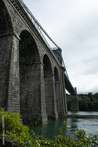 Vertical shot of Menai Suspension Bridge, Bangor, North Wales, UK photo