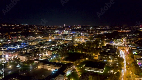 Wallpaper Mural Aerial night time lapse in 4k of downtown skyline in the city of Stuttgart, Germany  from left to right. Torontodigital.ca