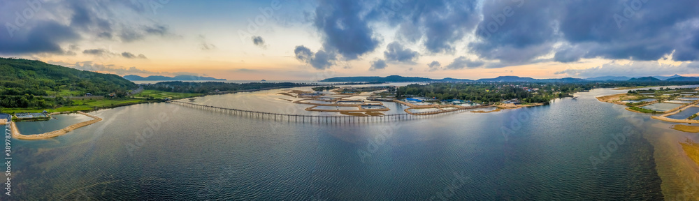 Obraz premium Aerial view of Ong Cop or Mr Tiger wooden bridge at Phu Yen, Vietnam. This is the longest wooden bridge in Vietnam