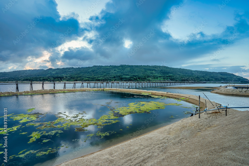 Aerial view of Ong Cop or Mr Tiger wooden bridge at Phu Yen, Vietnam. This is the longest wooden bridge in Vietnam Aerial view of Ong Cop or Mr Tiger wooden bridge at Phu Yen, Vietnam. This is the longest wooden bridge in Vietnam