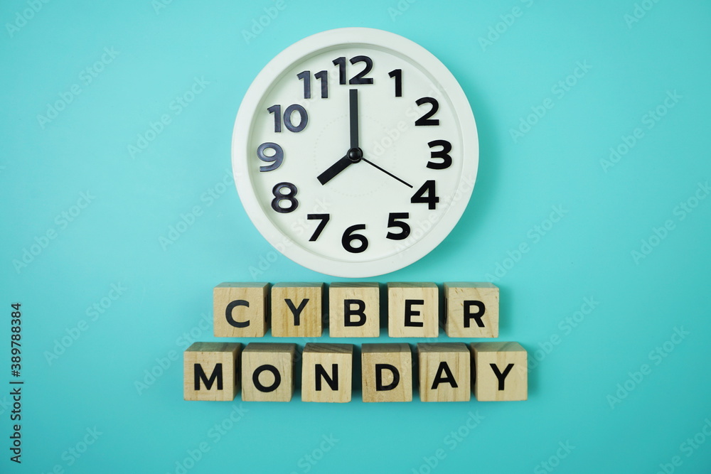 Cyber Monday with clock on blue background Cyber Monday with clock on blue background