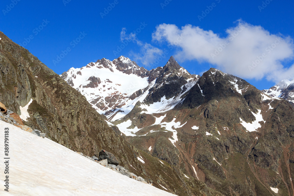 Mountain snow panorama and blue sky in Tyrol Alps, Austria