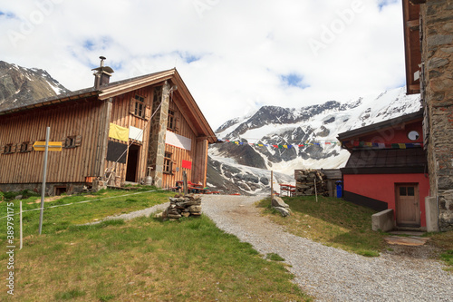 Mountain snow panorama with glacier Taschachferner and alpine hut Taschachhaus in Tyrol Alps, Austria photo