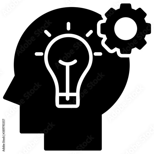 
A person with bulb inside his head and a gear symbolising new idea generation
