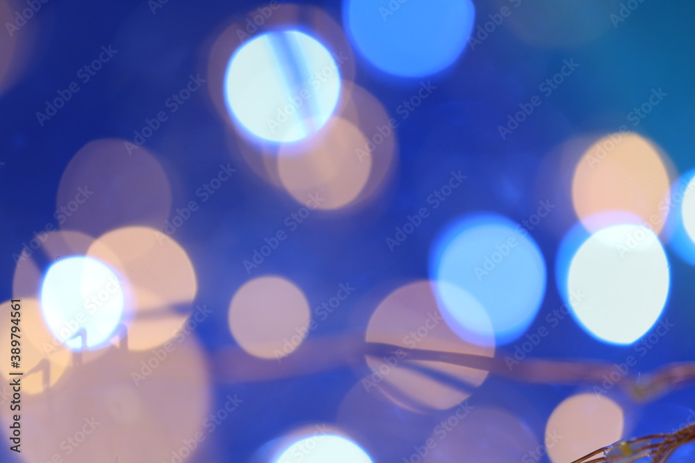 Bokeh background blue colors.Wallpaper phone shining blue bokeh.Winter beautiful shining abstract background in cold colors. Festive shiny bokeh texture.Cyan and blue bokeh background Bokeh background blue colors.Wallpaper phone shining blue bokeh.Winter beautiful shining abstract background in cold colors. Festive shiny bokeh texture.Cyan and blue bokeh background