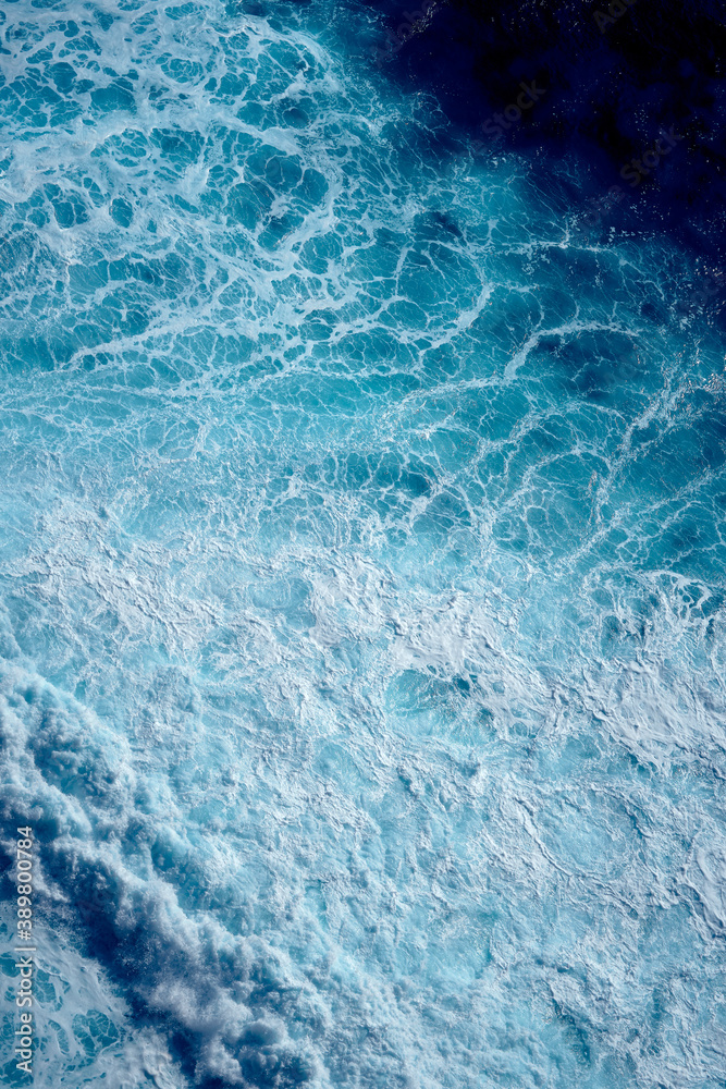 Fototapeta premium Aerial view to waves in ocean Splashing Waves. Blue clean wavy sea water